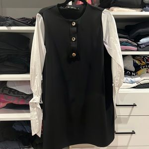 Zara black dress with gold button detail and bows on the sleeve.